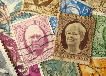 Postzegel met hoofden van fam. Kroes